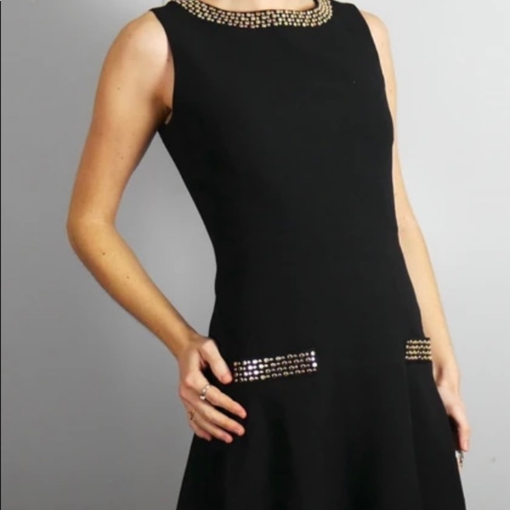 Beautiful black dress with golden studs